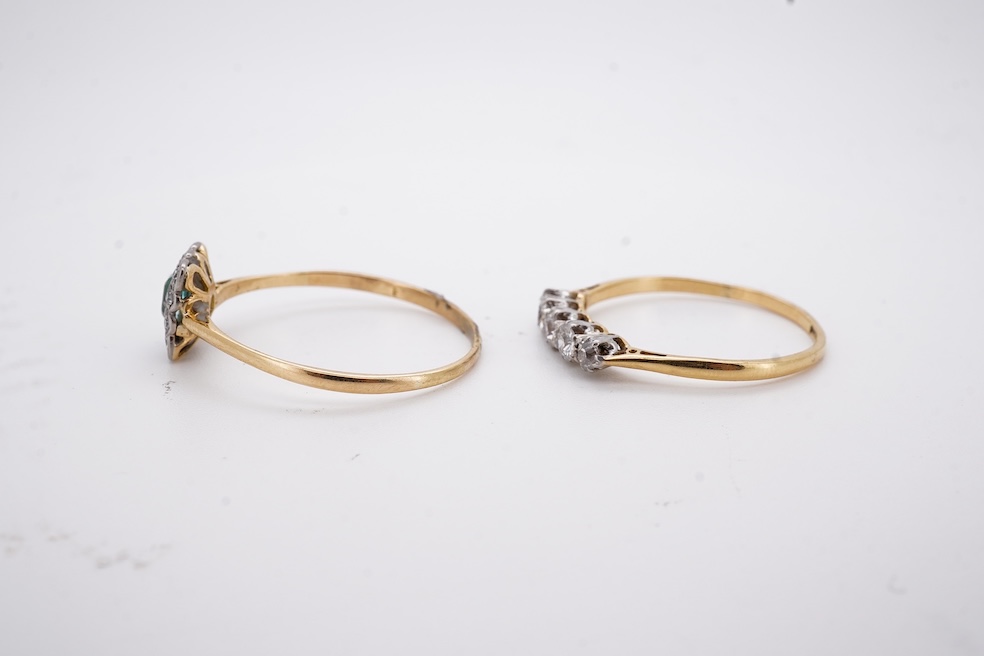 An 18ct and plat. five stone diamond set half hoop ring, size V together with a yellow metal emerald and diamond set tablet ring, size Z+++, gross weight 4.5 grams. Condition - fair